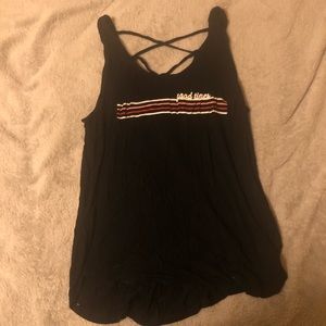 long and loose black no sleeve shirt